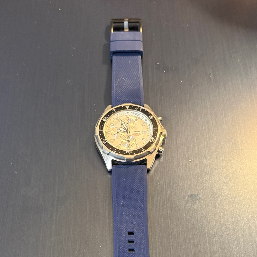 Casio Silver Case Watch with Blue Strap and Cream Dial